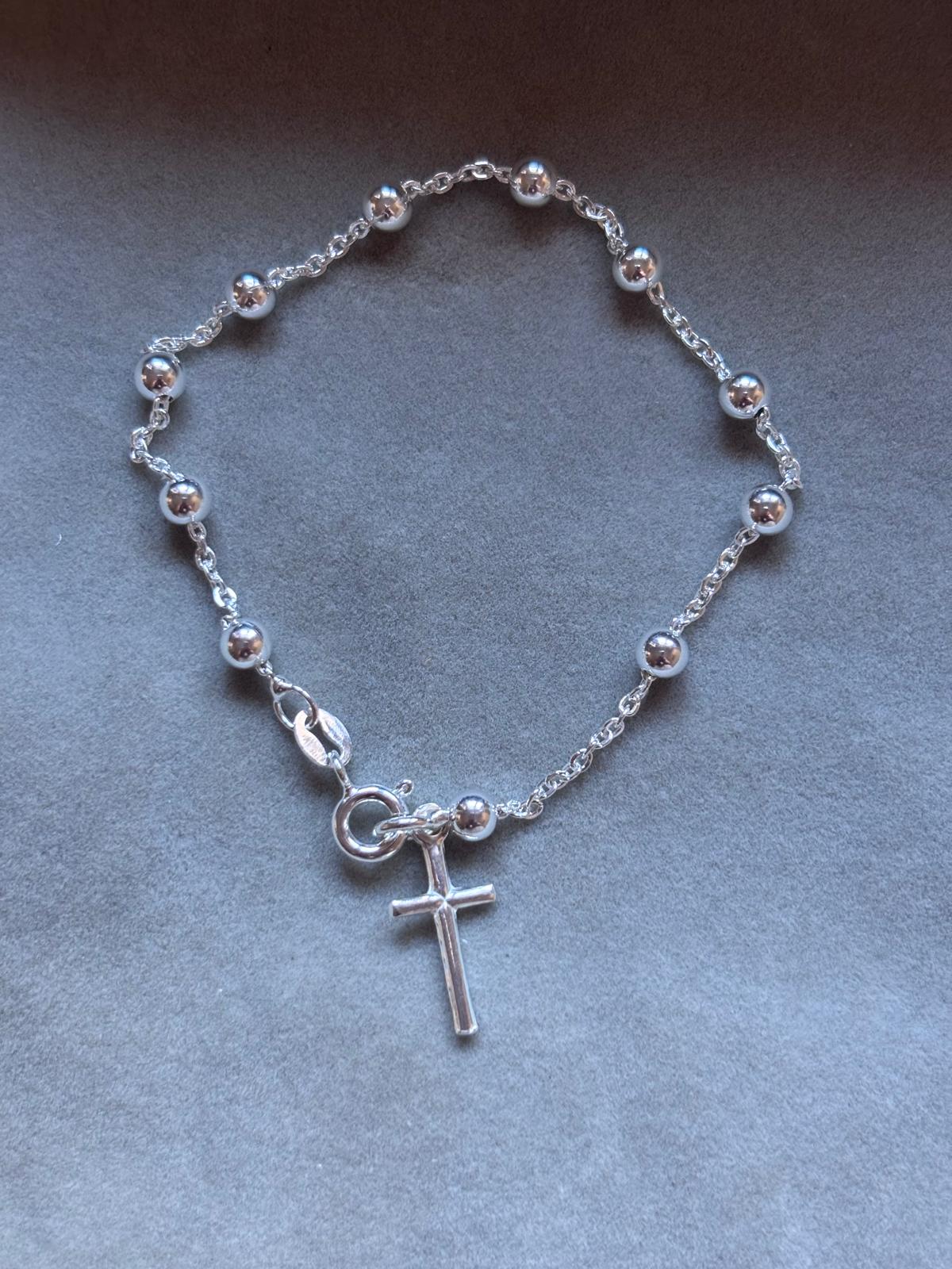 pulsera bolitas y cruz