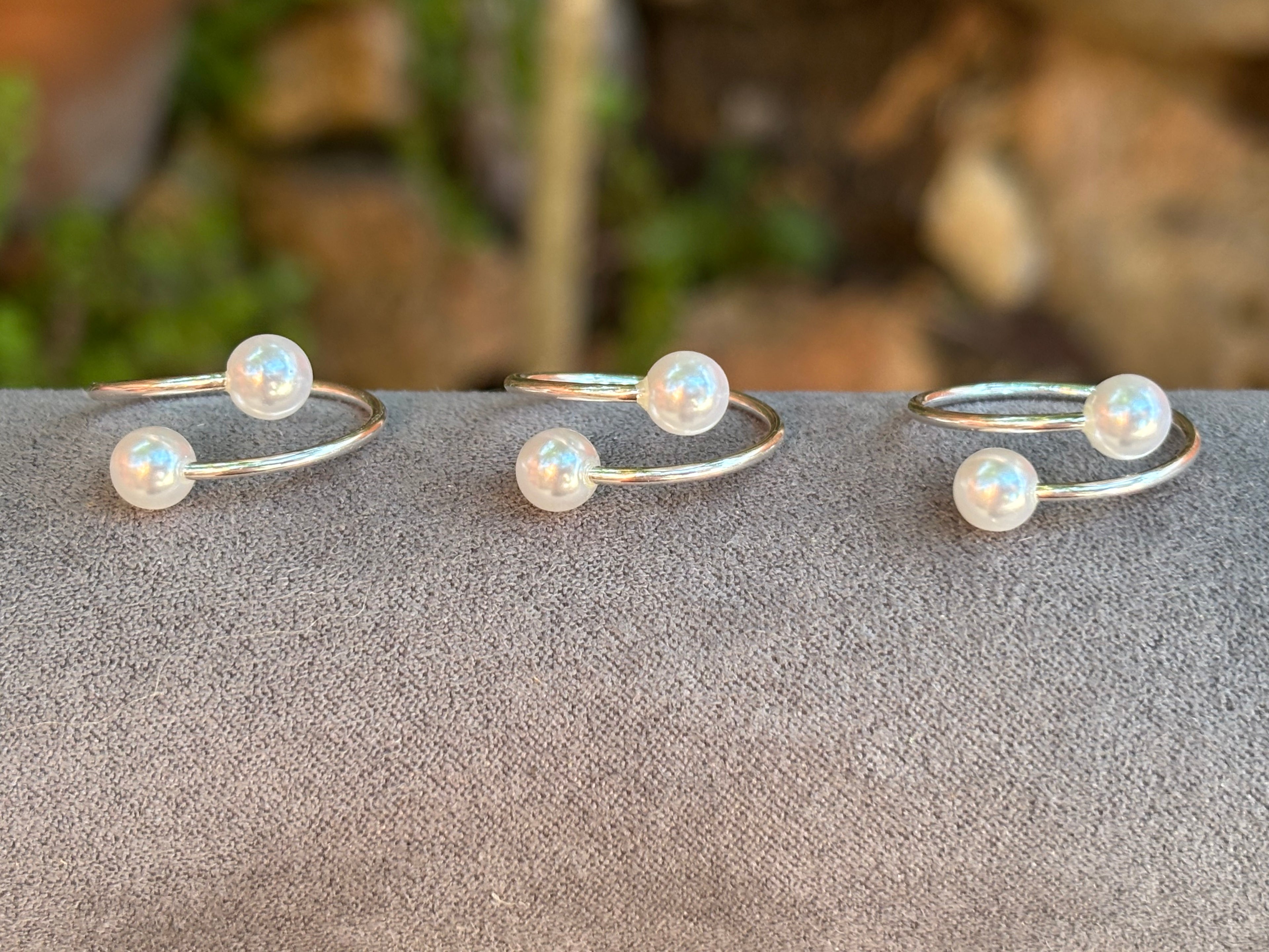 Anillo ajustable doble perla