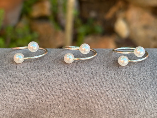 Anillo ajustable doble perla