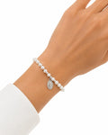 pulsera perlas y Virgen de la Milagrosa