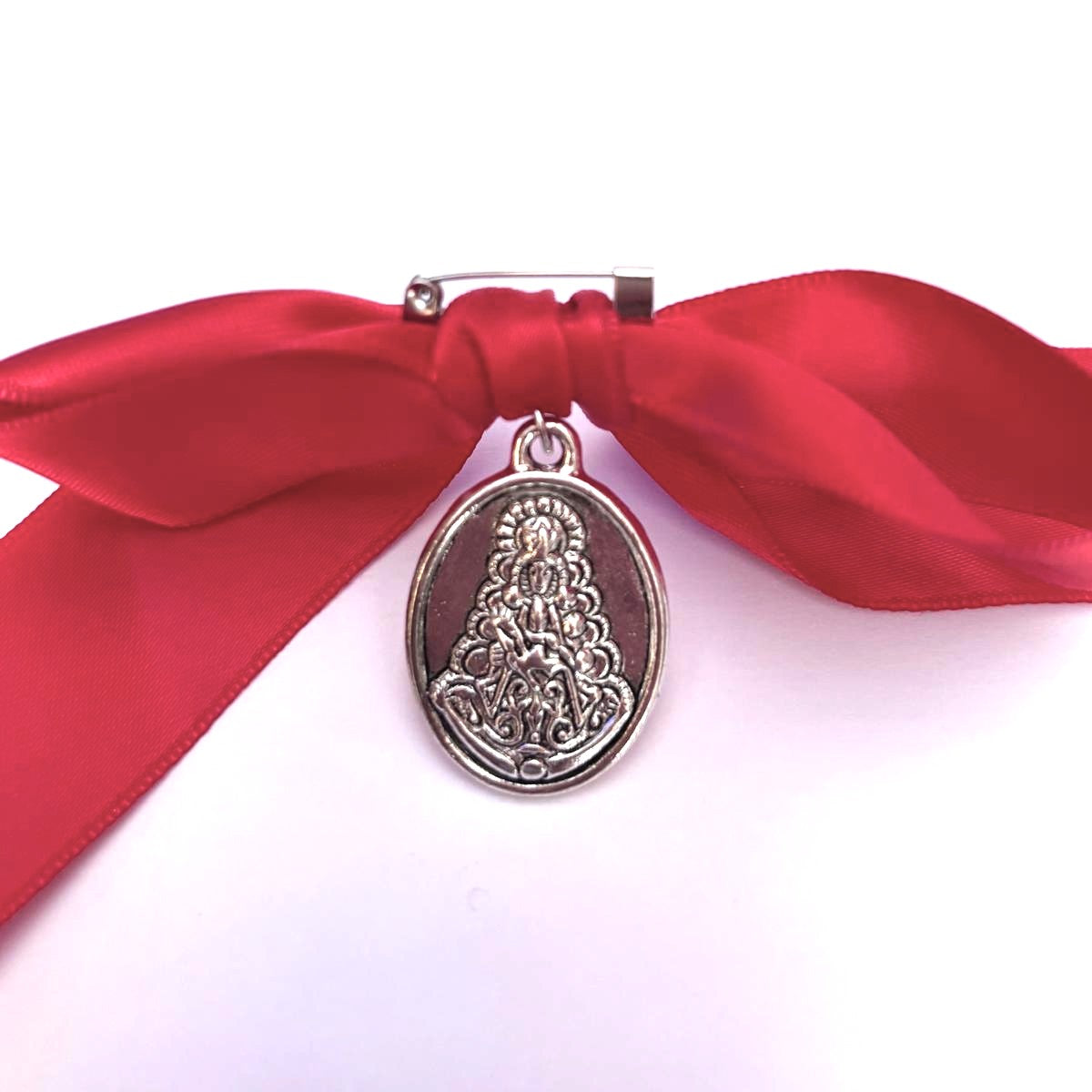 lazo con medalla para protección